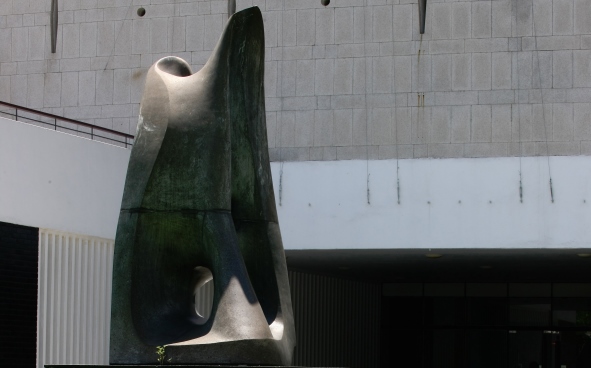 A Glance at the sculpture and the water pond inside Memorial Garden